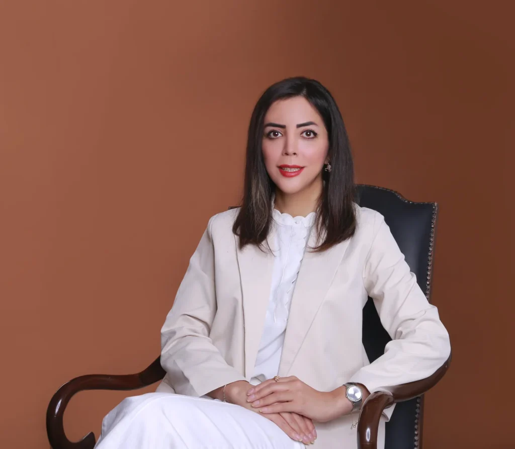 Paria Mortazavi seated in a leather armchair